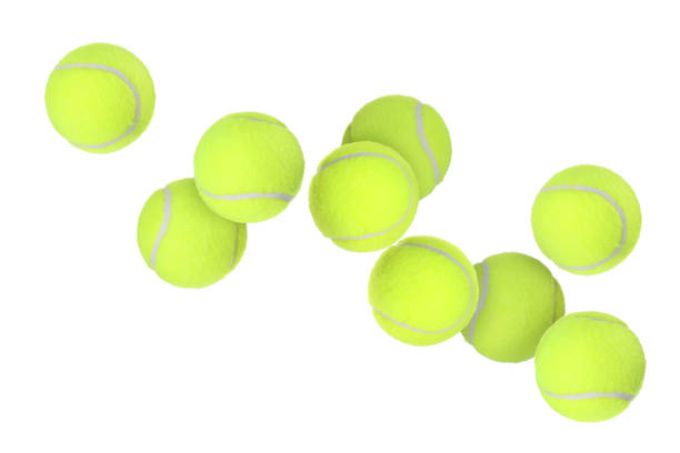 istock Many tennis balls flying on white background 2200091326