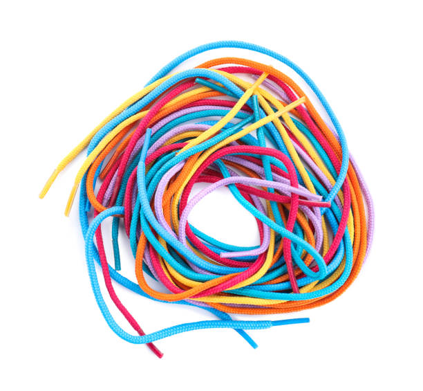 istock Many colorful shoe laces isolated on white, top view 2200091462
