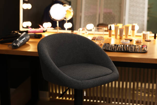 istock Makeup room. Chair near dressing table with different beauty products 2200093175