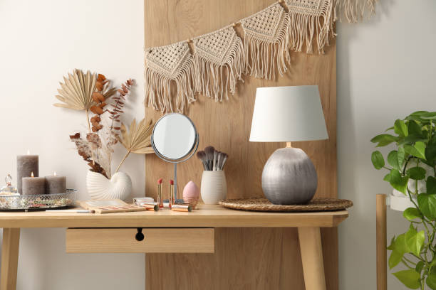 istock Dressing table with mirror, makeup products and decor in room 2200093181