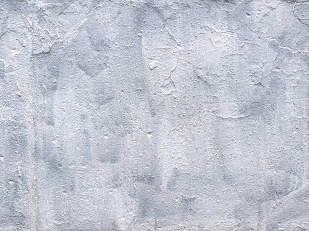 istock grunge stucco wall texture with white brush strokes. highly detailed texture series. 2200096768