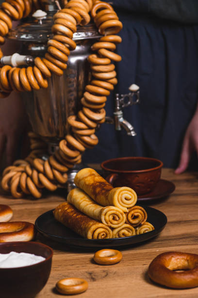 istock Rolled pancakes on a plate next to dryers and a samovar 2200097108