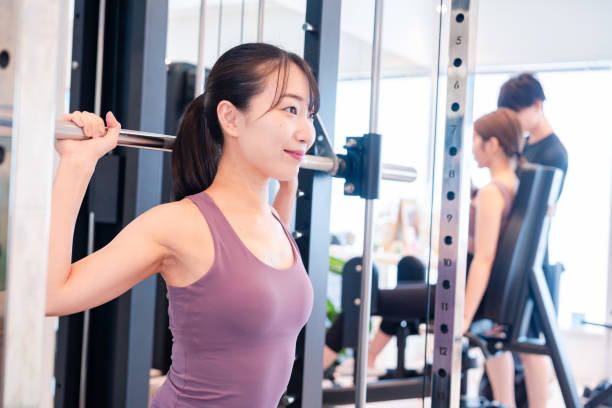 istock People who train on gym machines. 2200097995