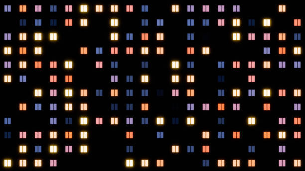 Facade of a multi-storey building with illuminated windows at night as a pixelated abstraction.