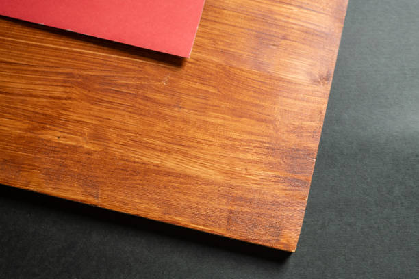 istock Wood grain and black and red background 2200108218