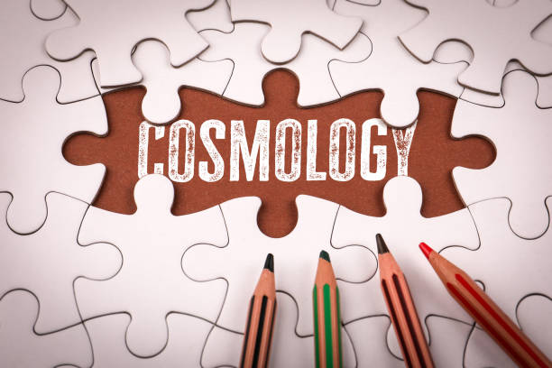 istock Cosmology. White puzzle pieces and colored pencils 2200109681