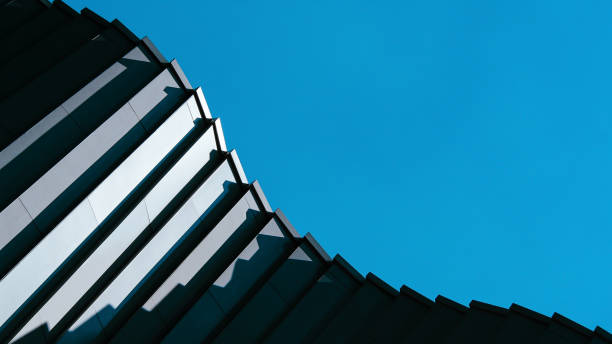 istock A repetitive glass facade creates a mesmerizing geometric pattern. The diagonal angle enhances depth and visual rhythm. 2200110601