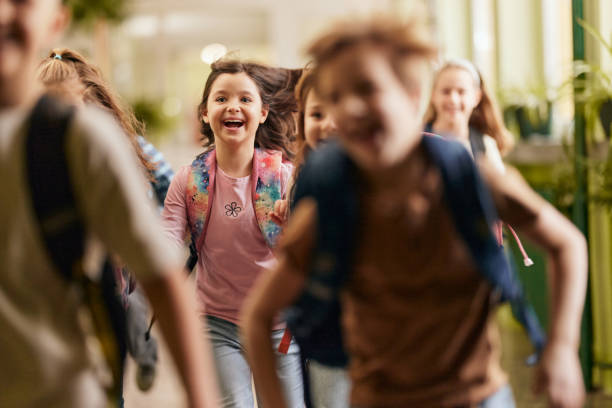 Running through school hallway! stock photo
