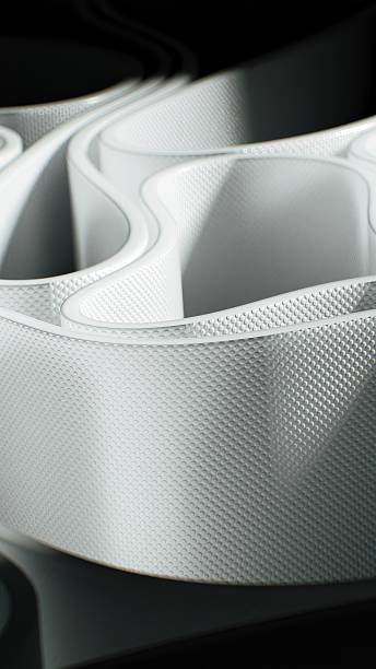 istock A close-up of a white, curved 3D surface with intricate textures and soft shadows. 2200114143