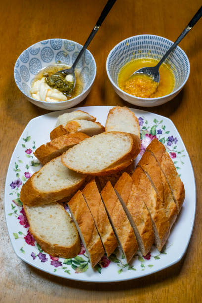 istock ingredients for cooking garlic bread on the table 2200114697
