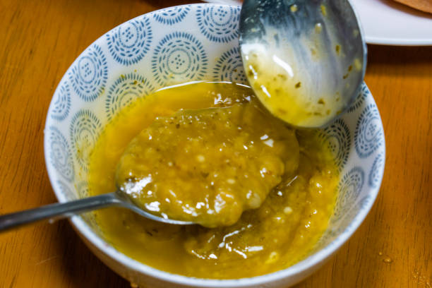 istock mixing various sauces for cooking garlic bread 2200114884