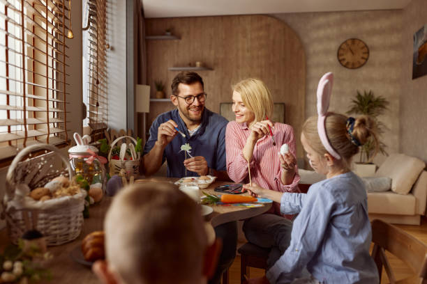 istock Happy family enjoying on Easter day at home. 2200120206