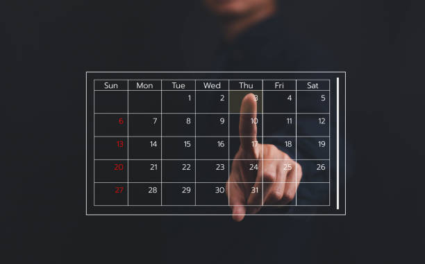 istock Business people use work schedules in business as a technological plan and project for proper planning and knowing the timeline of the work progress. 2200121746