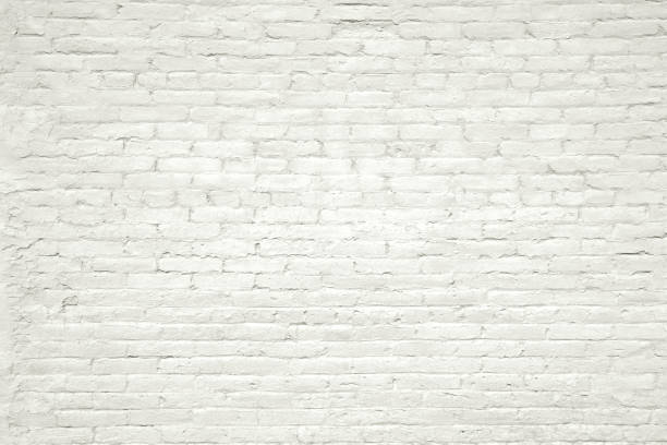 istock white vintage brick wall as symbol for history 2200125484