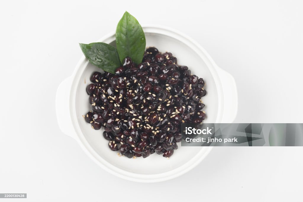 A side dish made by roasting or boiling soybeans and simmering them in soy sauce along with oil, sesame seeds, and starch syrup. Breakfast Stock Photo A side dish made by roasting or boiling soybeans and simmering them in soy sauce along with oil, sesame seeds, and starch syrup. Breakfast Stock Photo