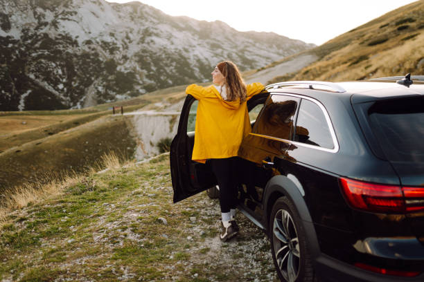 istock Stop during a journey. Young woman enjoying nature. 2200131830