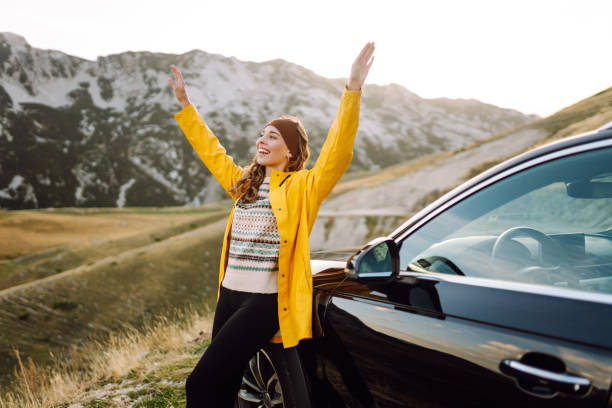 istock Stop during a journey. Young woman enjoying nature. 2200131839