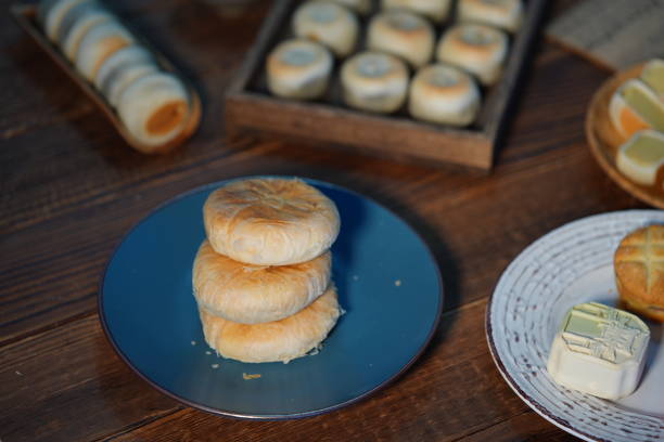 istock Chinese desserts and pastries placed in various containers on the table 2200132282