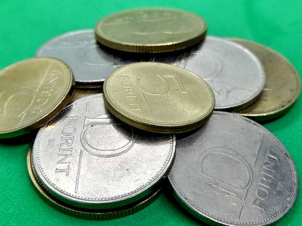 istock Hungarian forint coins with green background. 2200135319