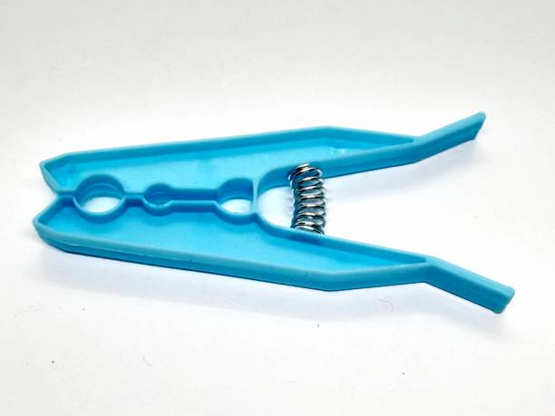 istock One blue strong clothespin with white background. 2200135587