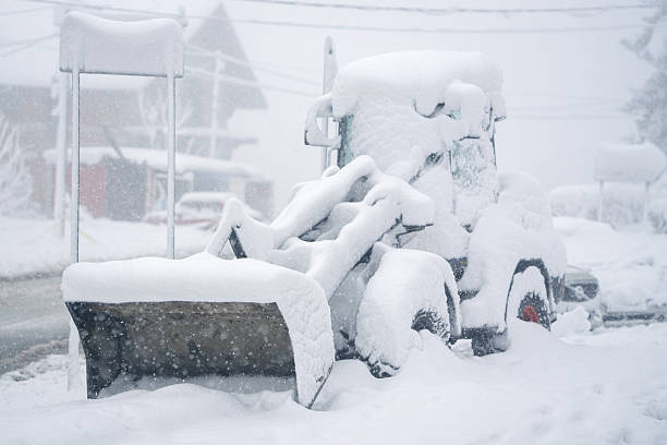 istock Snow blower stuck in snowdrift. 2200137676