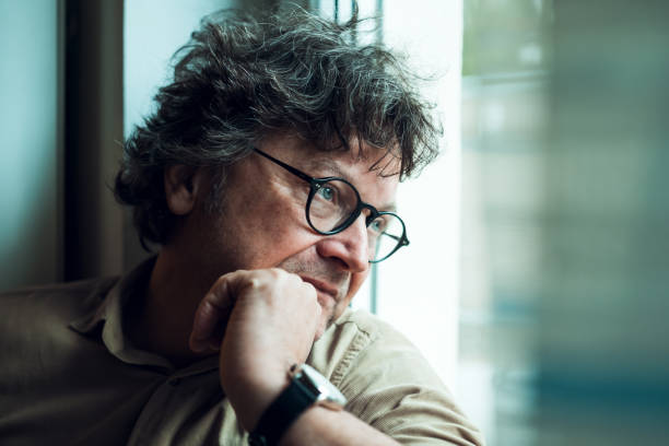 istock Depressed Man at Home 2200141758