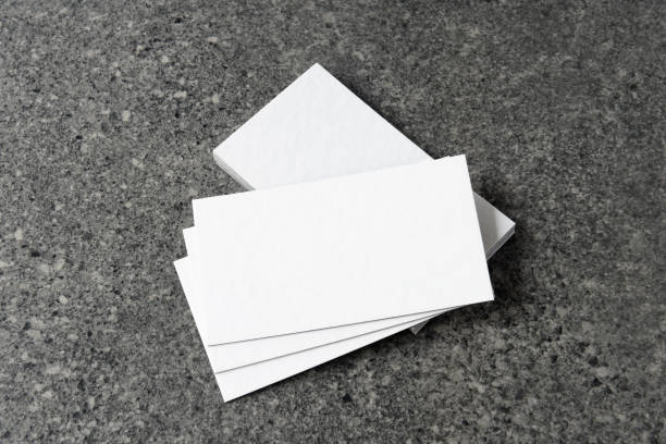 istock Business card on stone background. 2200142565