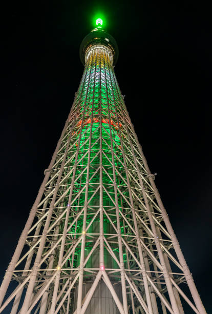 istock Looking up at Tokyo Sky Tree tower with a starry night sky 2200144214