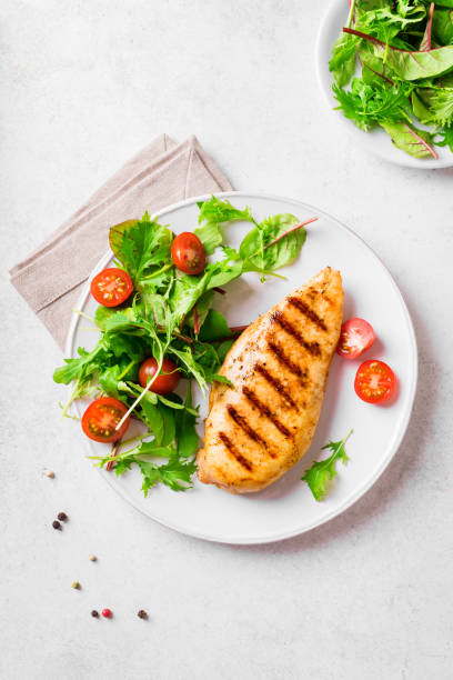 istock Grilled chicken breast and vegetable salad 2200144462