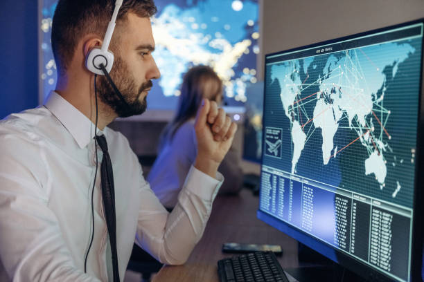 istock Map on the display. People are working by computers in airline company 2200146196