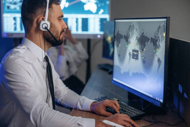istock Map on the display. People are working by computers in airline company 2200146205