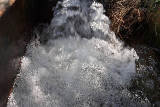 The bubbles are created on the flowing water for the high force