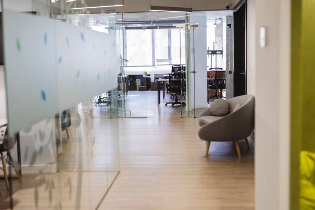 istock Modern office interior showing glass walls and waiting area 2200151308