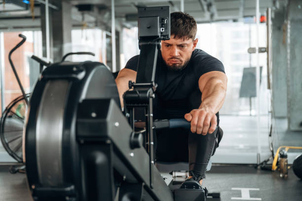 istock Man is in the modern gym 2200154384