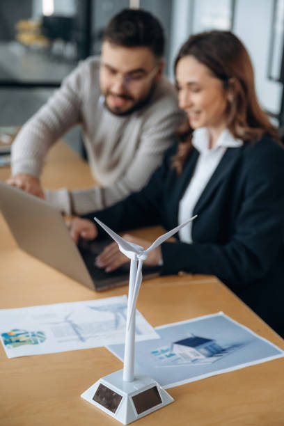 istock Man and woman are working in the office 2200158472
