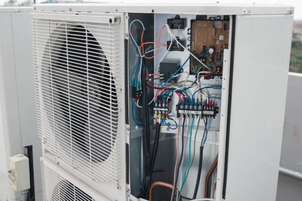 istock Technician is checking air conditioner,measuring equipment for filling air conditioners. 2200158521
