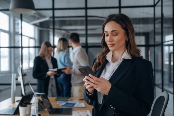 istock Phone call, standing. Business people are working in the office 2200158532