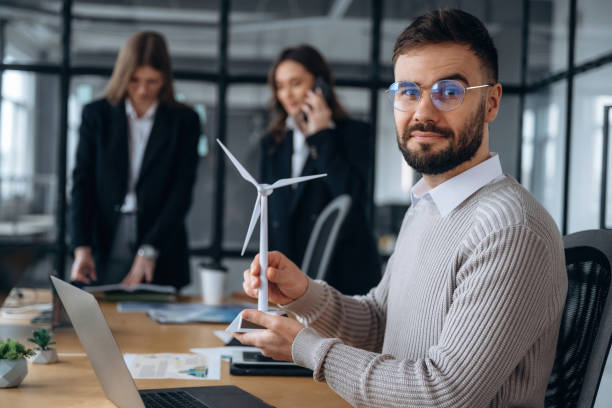 istock Professional employees. Business people are working in the office 2200158687