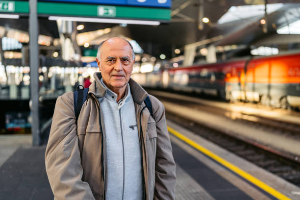 istock Senior Man Waiting For A Train In Vienna In Austria 2200158912