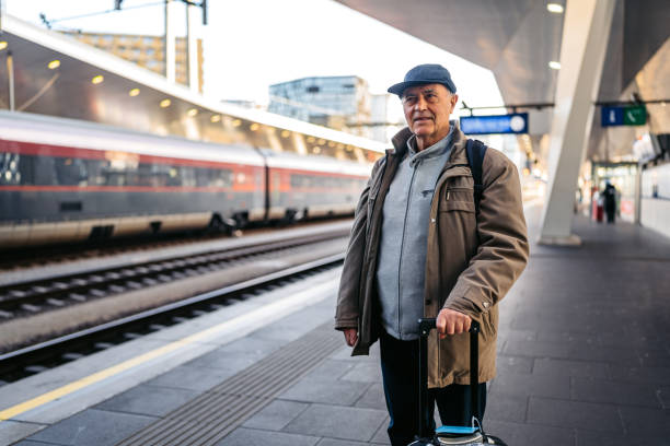 istock Senior Man Waiting For A Train In Vienna In Austria 2200158933