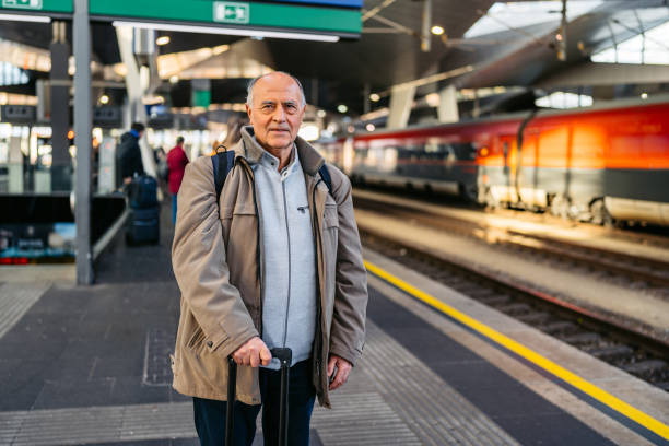 istock Senior Man Waiting For A Train In Vienna In Austria 2200159068