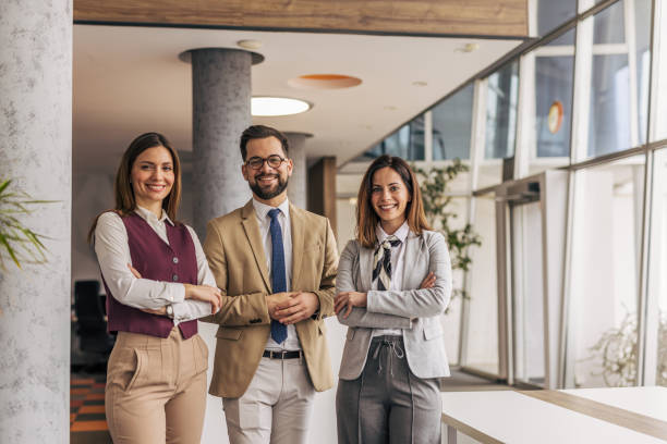 istock Confident business team posing in modern office 2200160711