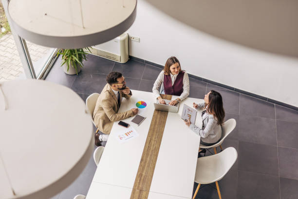 istock Business professionals engaging in productive meeting 2200161586