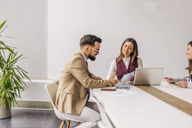 istock Business team discussing project in modern office 2200161748