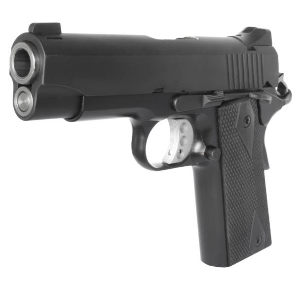 istock Semi-automatic pistol quartering toward the camera 2200162593
