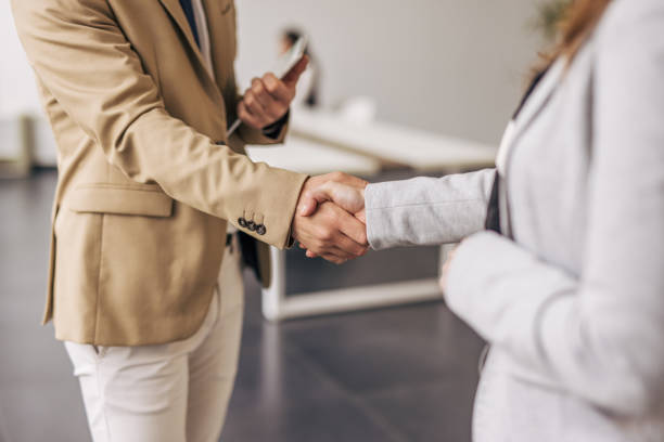 istock Business people shaking hands during a meeting in the office 2200163402