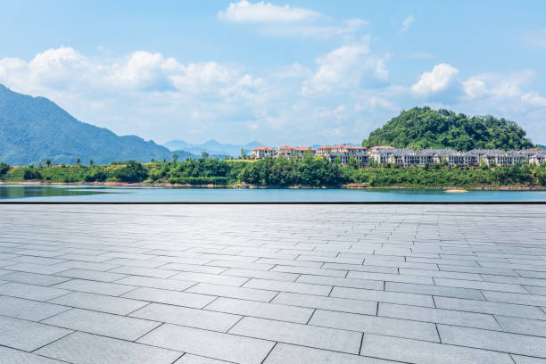istock Empty square floor and lake with island nature landscape in summer 2200167155