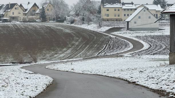 istock Rural road in winter, curved 2200168503