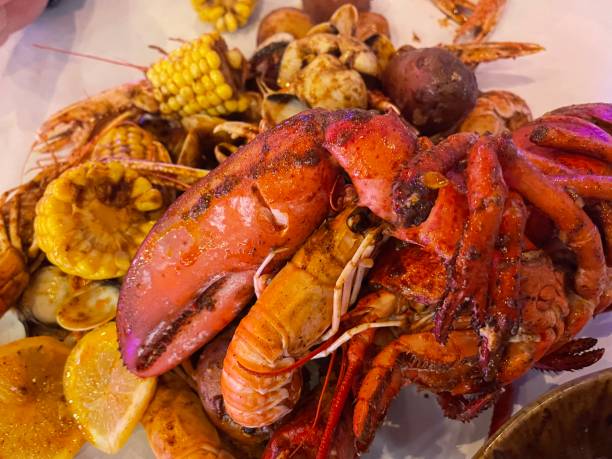 istock Cajun seafood with spices and corn 2200169551