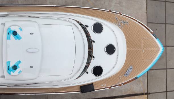 istock At the shipyard. Blue Luxurious yacht ready for launch. Ship building industry. 2200175974